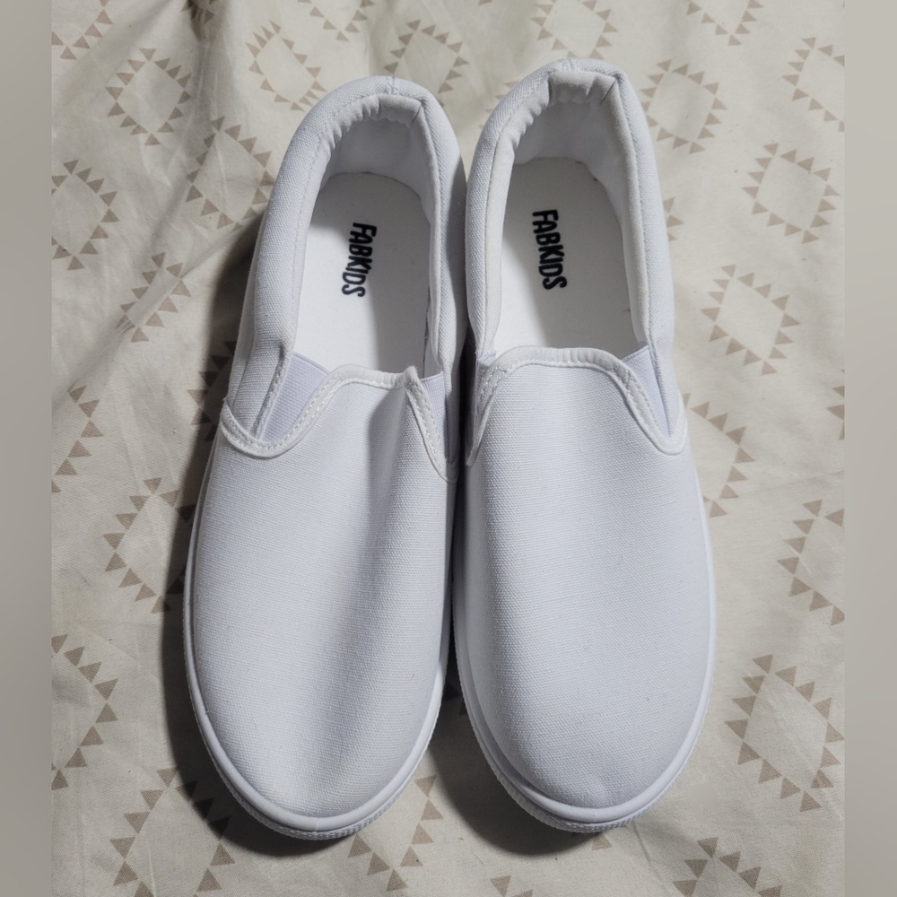 Youth size 6 white canvas shoes